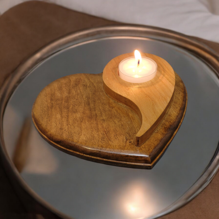 Natural wood tealight holder, in the shape of a heart with the yin yang symbol on top.