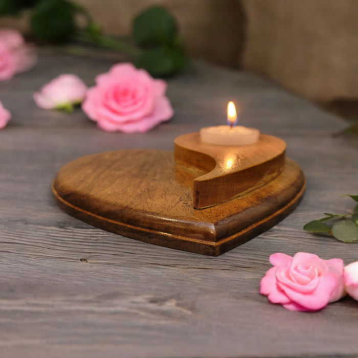 Natural wood tealight holder, in the shape of a heart with the yin yang symbol on top.