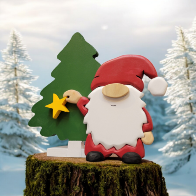 Christmas gnome with while beard, red hat, holding a yellow star, standing in front of a tall green tree.