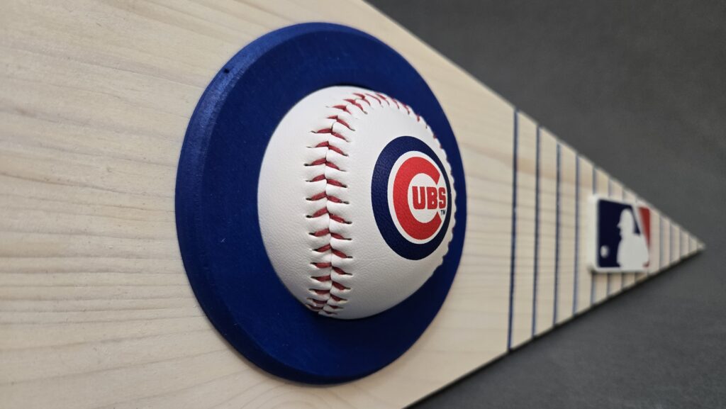 Chicago Cubs Pennant with a real baseball inserted into the wood.